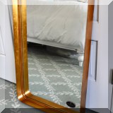 D06. Uttermost gold rimmed mirror. 31”h x 20”w 